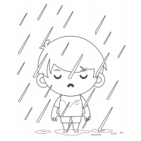 Мальчик стоит под дождем